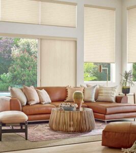 western aesthetic living room with window treatments for sliding glass doors open overlooking pool