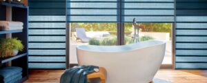 blue bathroom at resort with dual opacity shades