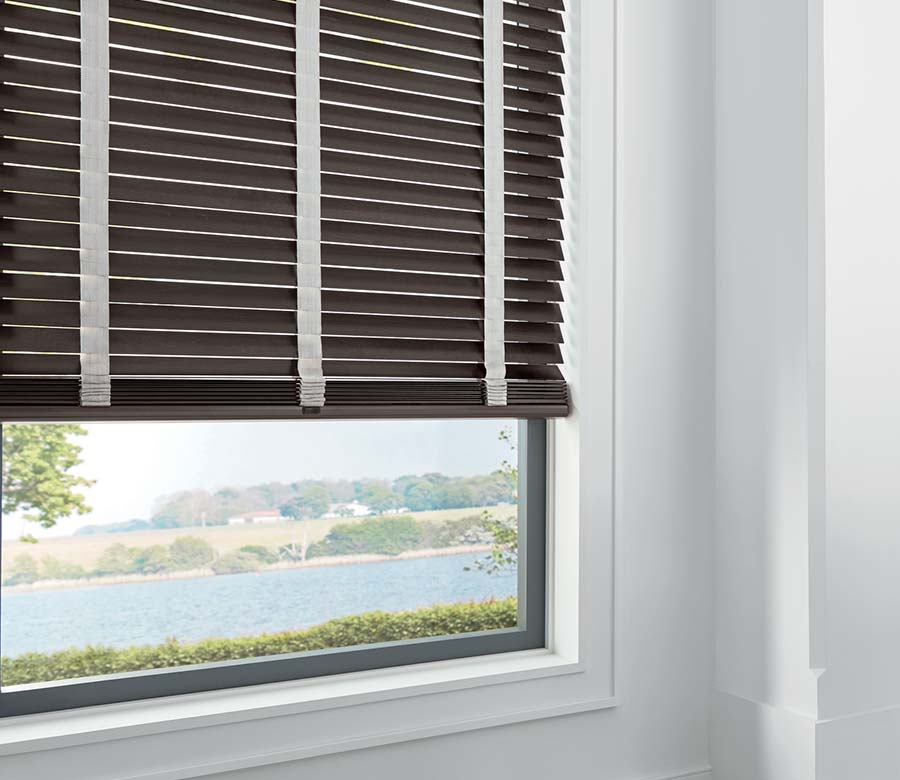 brown wood blinds overlooking Omaha river