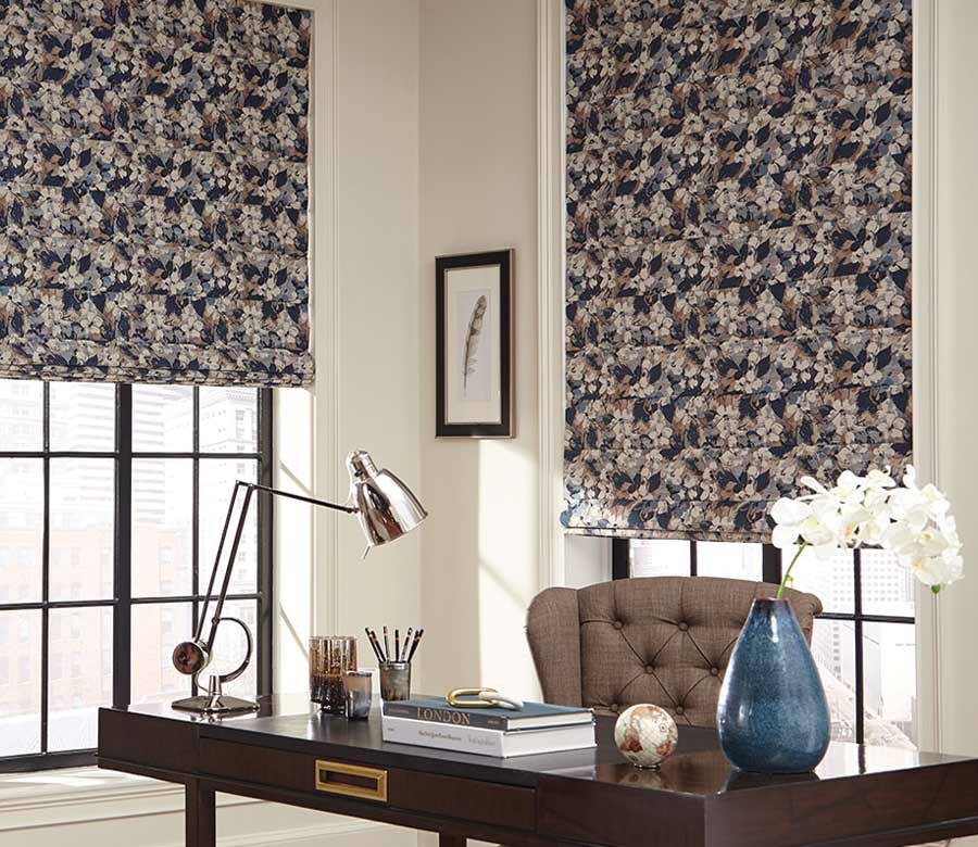 floral print roman shades in home office over black trim windows in Omaha home