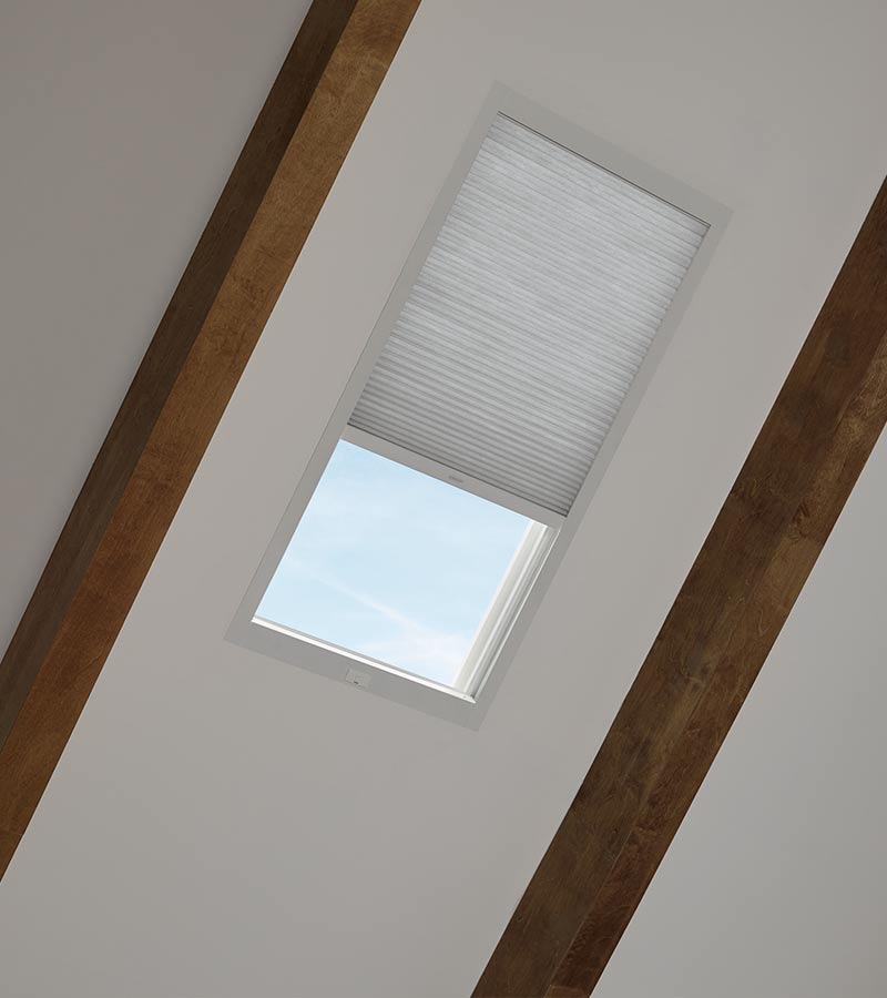 skylight shades in gray honeycomb by hunter douglas