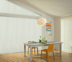 vertical blinds on angled windows and large sliding door