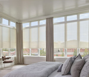 draperies on floor to ceiling windows with screen shades in Omaha