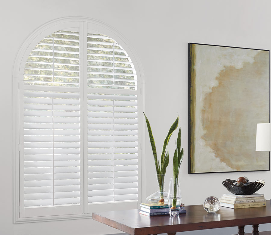 newstyle-shutters-home-office-arched-window-hunter-douglas-integrated-windows