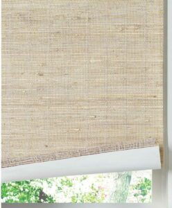 The attached liner can block in-coming light even with a light-colored shade. It is in a neutral tone and cascading down a window with the bottom part rolled up to show the backside.